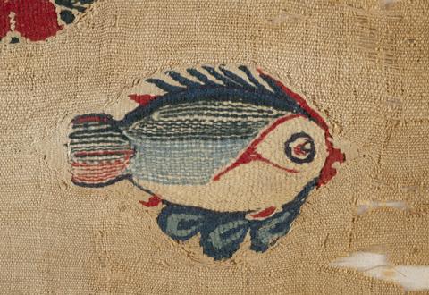 Fragment de tissu représentant un poisson