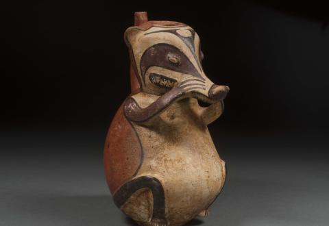 Vessel in the form of an opossum