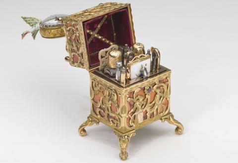 Necessaire case with a clock, gilt copper, chalcedony, garnets, diamonds and enamel